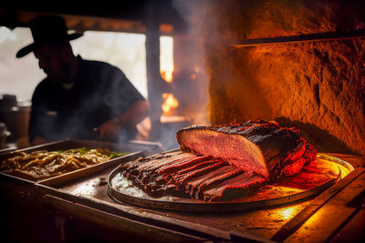 Man preparing food on barbecue grill