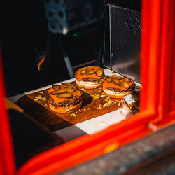 High angle view of illuminated lanterns hanging on table