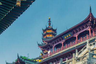 Low angle view of temple building against sky