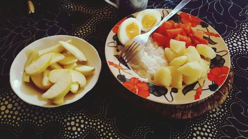 Close-up of fruits in plate on table