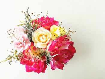 Close-up of rose bouquet against white background