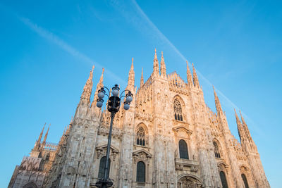 Low angle view of cathedral against blue sky