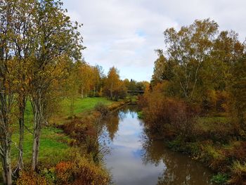 Scenic view of lake against sky during autumn