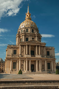 Front facade of les invalides palace with the golden dome in paris. the famous capital of france.