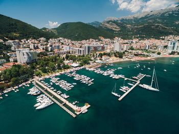 High angle view of city by sea