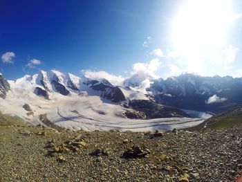 Scenic view of snow covered mountains