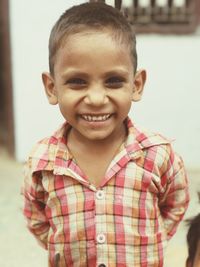 Portrait of cute boy smiling