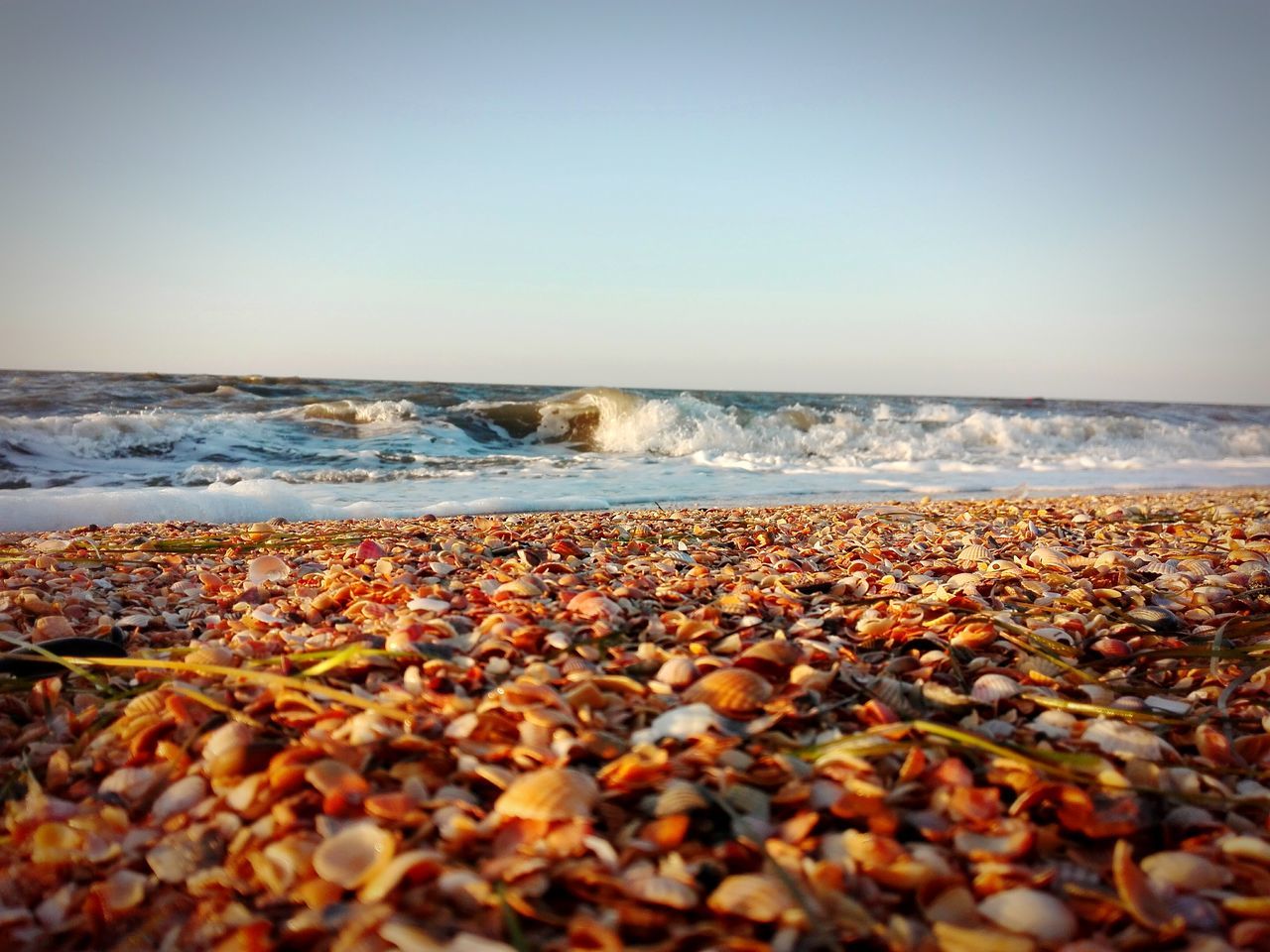 WAVES SPLASHING ON ROCKS AT SHORE