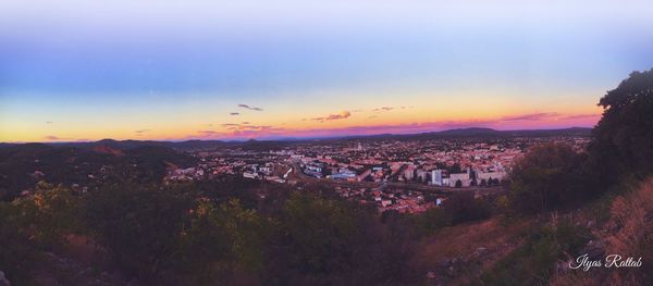 High angle view of townscape against sky during sunset