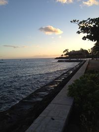 Scenic view of sea at sunset