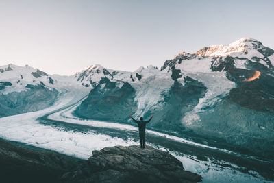 Scenic view of snow mountains against clear sky