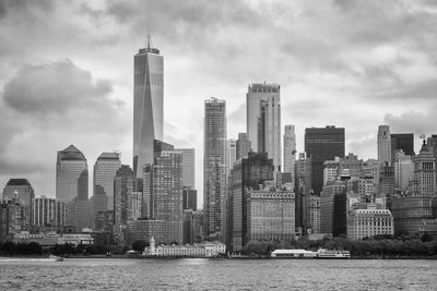 Modern buildings in city against sky