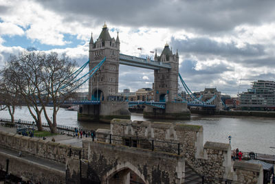 London bridge over river with buildings in background