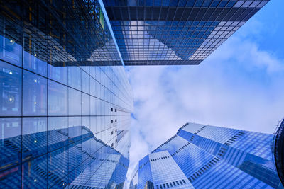 Low angle view of modern buildings against sky