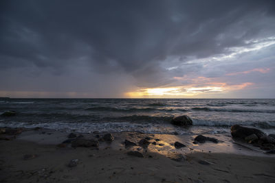 Scenic view of sea against sky during sunset