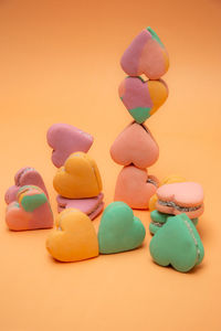 Close-up of multi colored candies on table