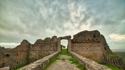 Old ruins against cloudy sky