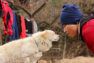Close-up of man with dog