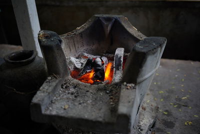 Close-up of fire on wood