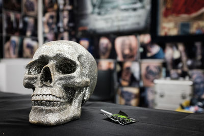 Close-up of human skull on table