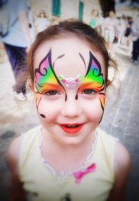 Portrait of smiling girl wearing mask