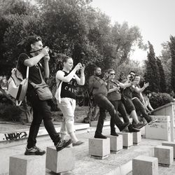 Friends standing in park