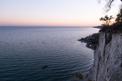 Scenic view of sea against sky at sunset