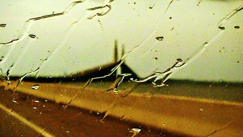 Close-up of water drops on glass