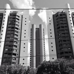 Low angle view of skyscrapers against sky