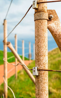 Close-up of rusty metal fence