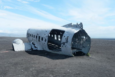 Abandoned airplane on beach