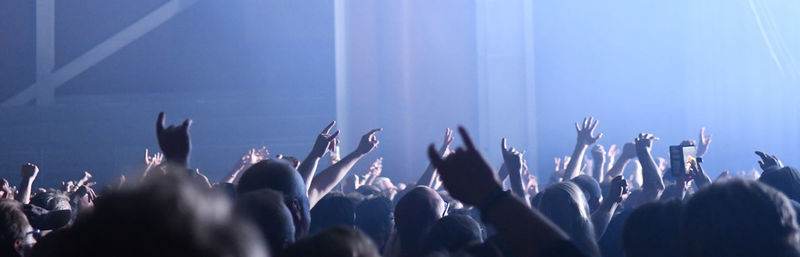 People dancing at music concert