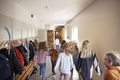 Girls at school corridor