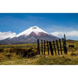 Scenic view of landscape against cloudy sky