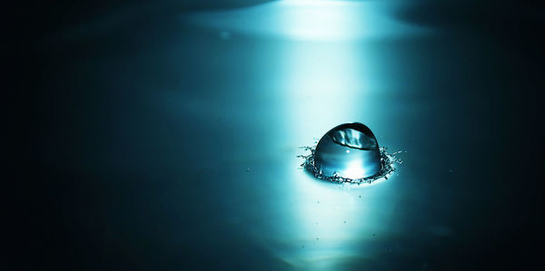 Close-up of water against blue background