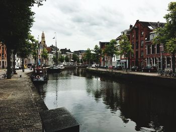 View of boats moored in city