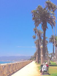 Scenic view of sea against blue sky