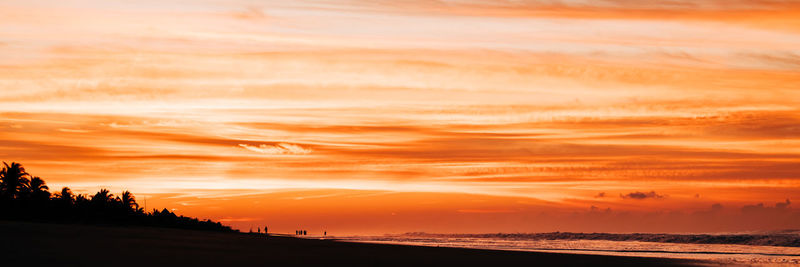 Scenic view of silhouette landscape against sky during sunset