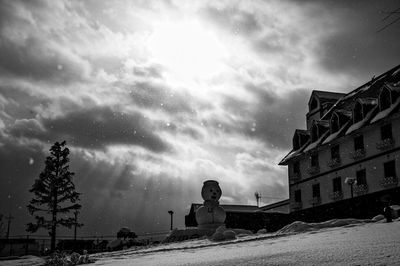 Built structure against cloudy sky