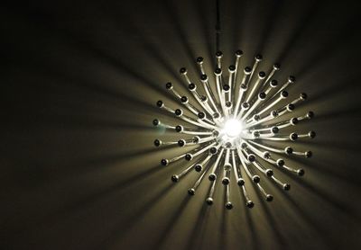 Low angle view of illuminated ceiling