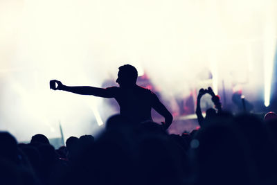 Crowd enjoying at music concert