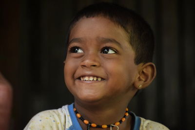 Close-up portrait of smiling boy