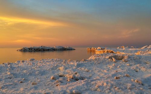 Scenic view of sea against sky during sunset