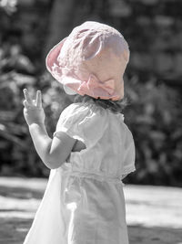 Cute girl standing outdoors