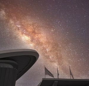 Low angle view of building against sky at night