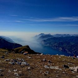 Scenic view of landscape against blue sky