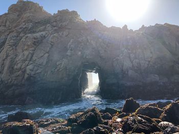 Scenic view of rock formation amidst sea