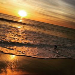 Scenic view of sea at sunset