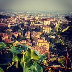 Aerial view of cityscape against sky