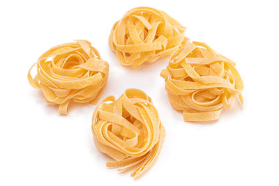 Close-up of pasta on white background